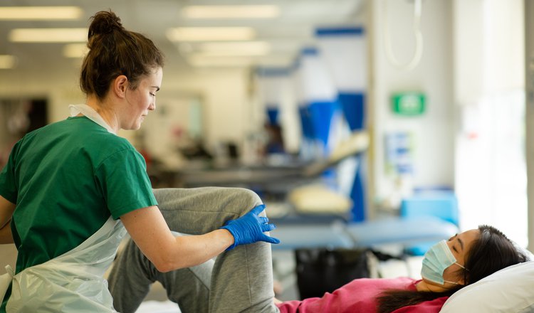 Doctor treating patient